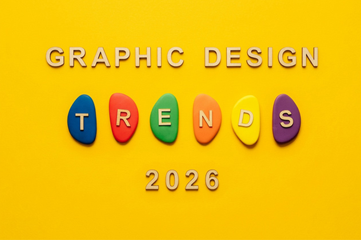 colour stones with-text-that says-graphic-design-trends 2026